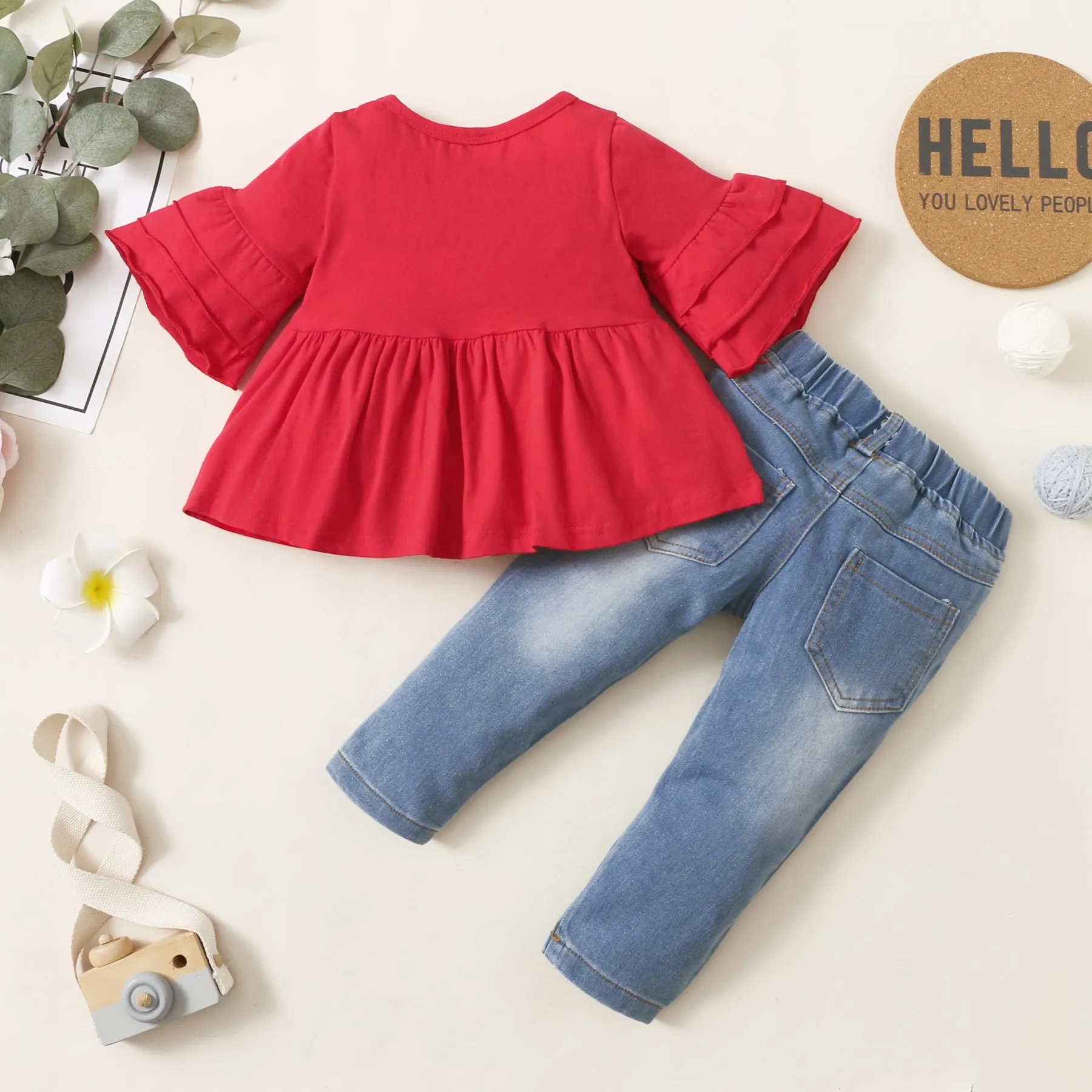 2pcs Baby Red Bell Sleeve Loose-fit Top and Floral Embroidered Ripped Denim Jeans Set