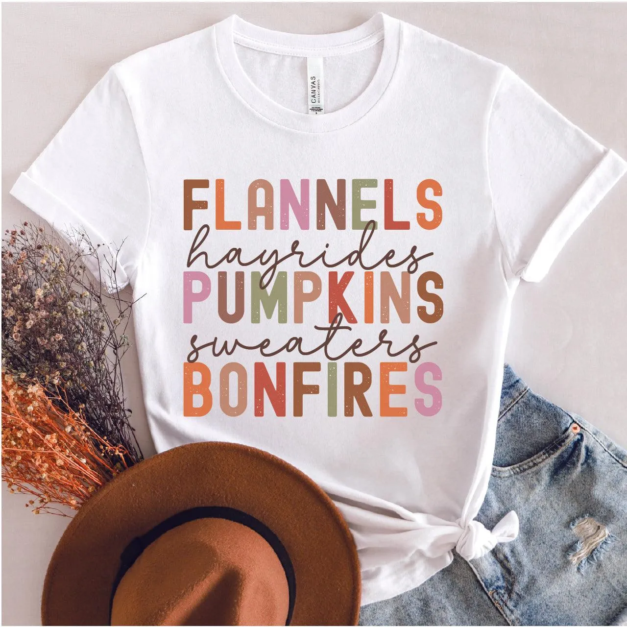 Flannels Hayrides Pumpkins Sweaters & Bonfires Graphic Tshirt